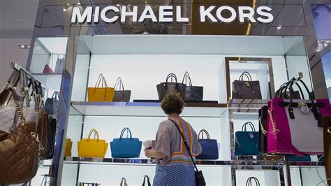 michael kors earnings